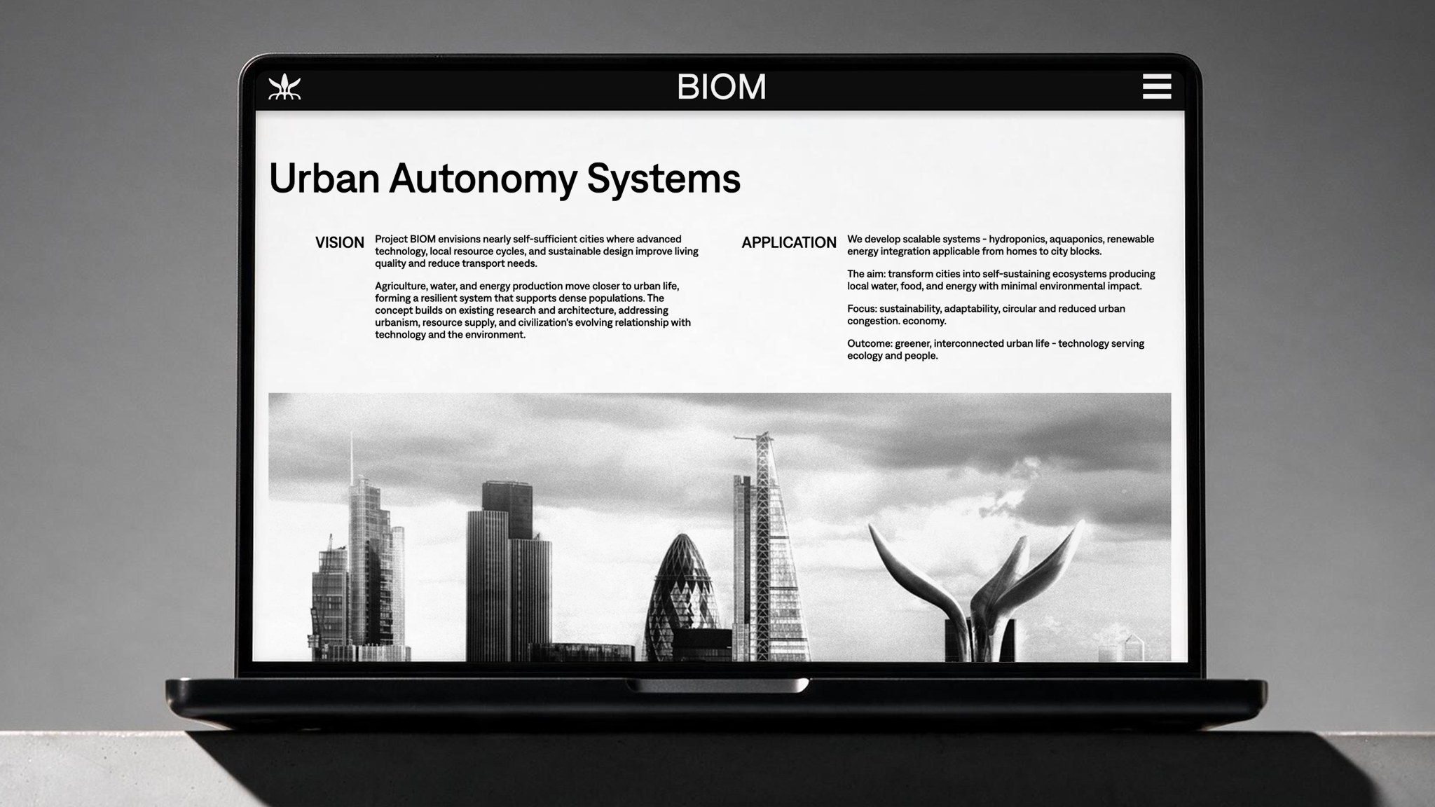 A laptop displaying the BIOM website's 'Urban Autonomy Systems' page