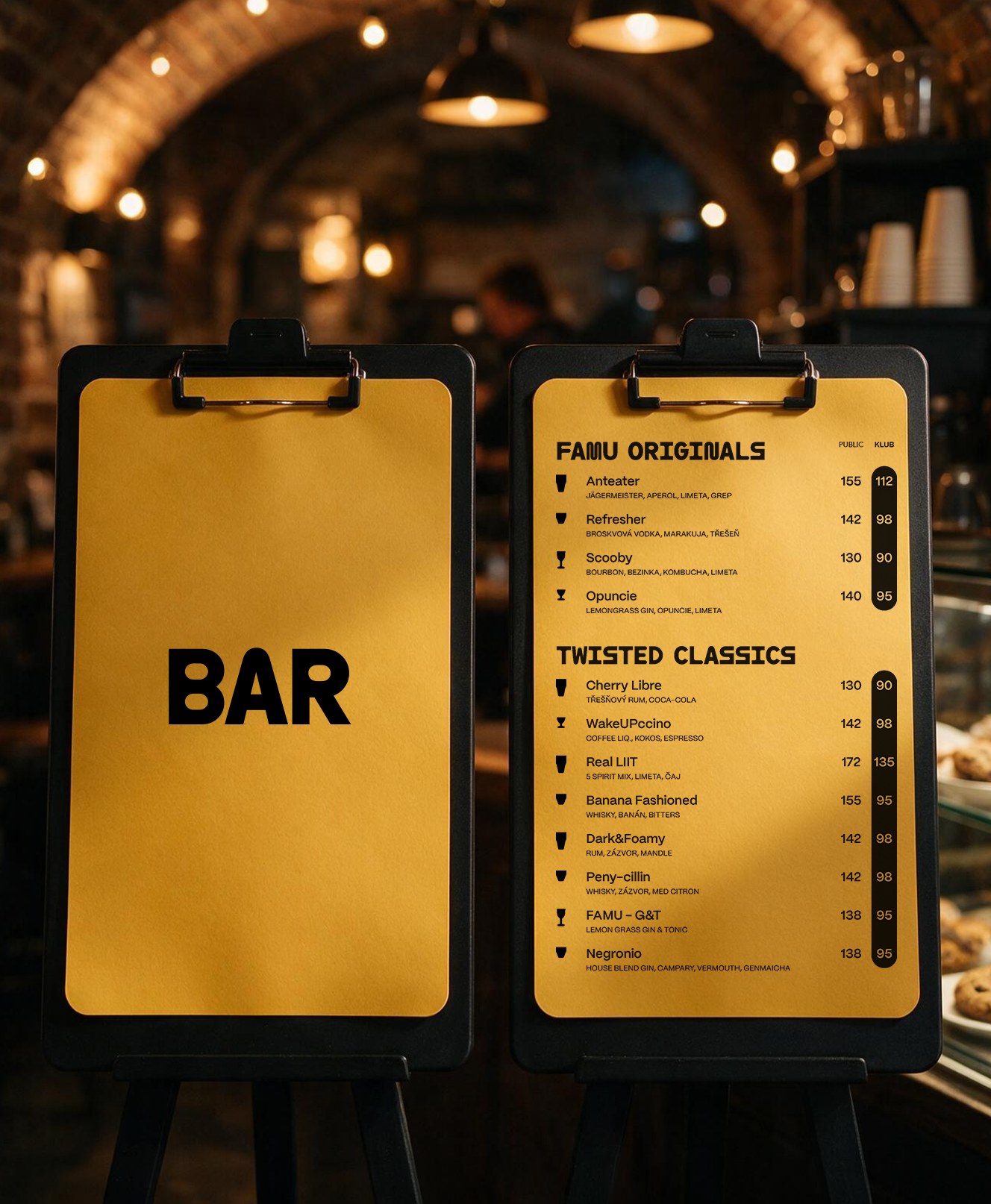 Interior view of the KlubFamu bar counter with menu boards