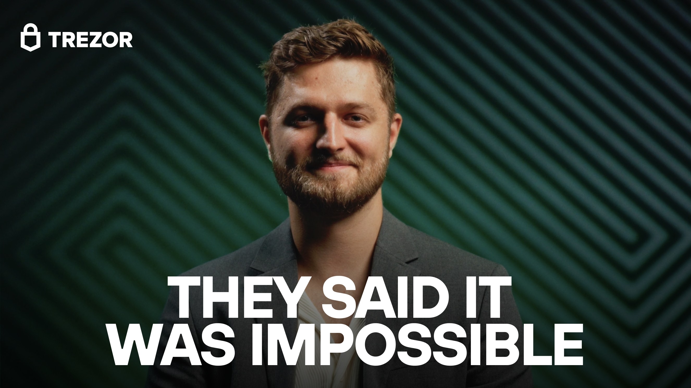A portrait of a Trezor team member overlaid with the bold headline 'They said it was impossible'